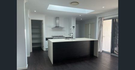 FULLY FENCED MODERN HOME IN AN IDEAL LOCATION - Photo 5