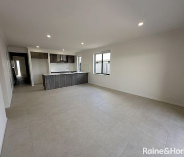 Brand New 4-Bedroom, 2-Living Family Home in Munno Para Downs - Photo 1