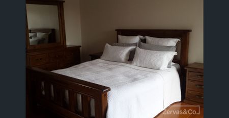 This well-maintained 3-bedroom family home - Photo 5