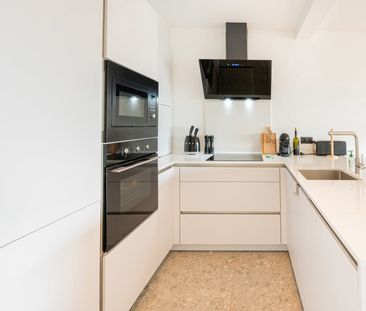 Knappe penthouse met terras en prachtig uitzicht - Photo 6