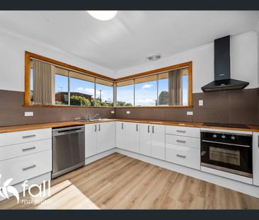 Elevated Top Floor Living with Space & Convenience - Photo 2