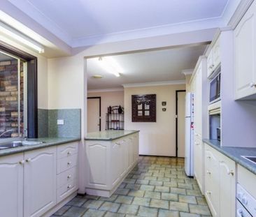 Spacious 3-Bedroom Brick Home in Convenient Location - Photo 5
