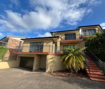 Modern 4-Bedroom Duplex with River Views | Spacious Family Living - Photo 2