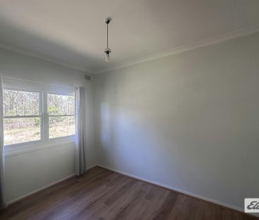 Rural home in the heart of town - Photo 3