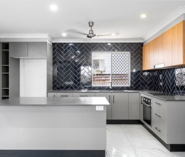 Charming Renovated Home with Shed - Photo 3