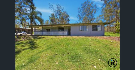 Family-Ready Acreage Property with Shed, Carports & Easy Access to Schools & Transport! - Photo 5