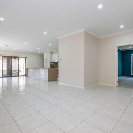 SPACIOUS FAMILY HOME WITH THEATRE & MULTIPLE LIVING AREAS - Photo 3