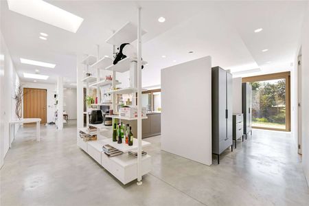 A fantastic, contemporary four bedroom home located on the prestigious West Hill Road. - Photo 2