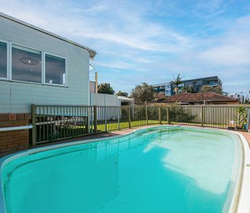 Newly Renovated Charming Home with Pool and Lock up Garage - Photo 2