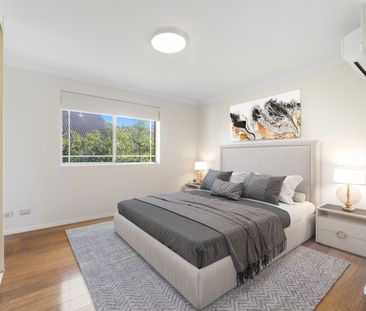 Warm and inviting top floor apartment sure to make you feel right a... - Photo 3