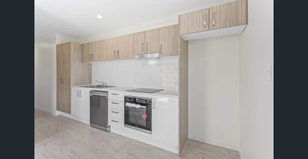 LOW MAINTENANCE AND MODERN 2 BEDROOM HOME WITH AIR CON AVAILABLE SOON! - Photo 4