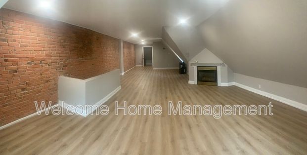 $2,395 / 2 br / 1.5 ba / Solid brick semi-detached home in prime location! - Photo 1