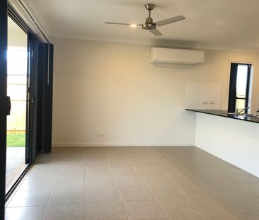 Spacious 4 bedroom + study home with air conditioning - Photo 1