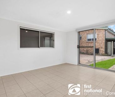 Gorgeous 4-Bedroom Home with Self-Contained Studio - Photo 2