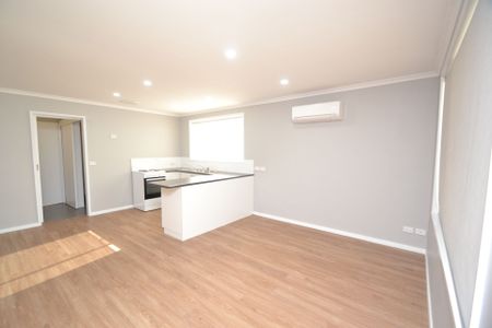 Renovated Unit with Large Yard. Water Usage Included. - Photo 3