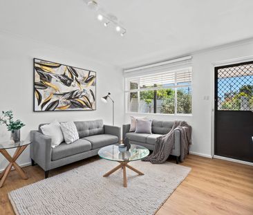 Easy Coastal Living – Refreshed & Ready to Enjoy - Photo 1