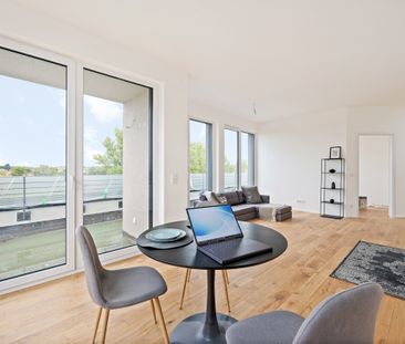 *ERSTBEZUG*Wohnen über den Dächern – Moderne Penthouse-Oase in Flus... - Photo 1