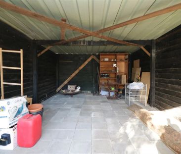 Rustig gelegen woning met 2 slpk, riante tuin en garage te Herselt - Photo 6