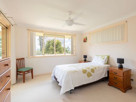 Spacious Family Home with Covered Deck and Convenient Location - Photo 2