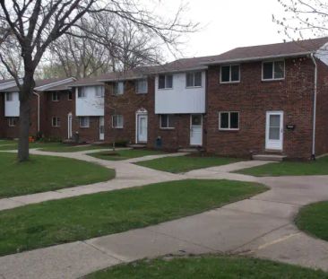 Anchorage on the Park Townhomes | 2932-2992 Wildwood Dr., Windsor - Photo 1