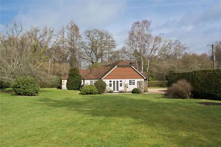 An idyllic family home in a rural setting just outside the village of Church. - Photo 4