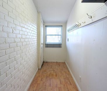 Spacious 2 Bed + Den, 1.5 Bath Townhouse in Downtown Windsor - Photo 1