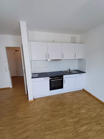 Helle 1-Zimmer Neubauwohnung mit Balkon - Foto 4