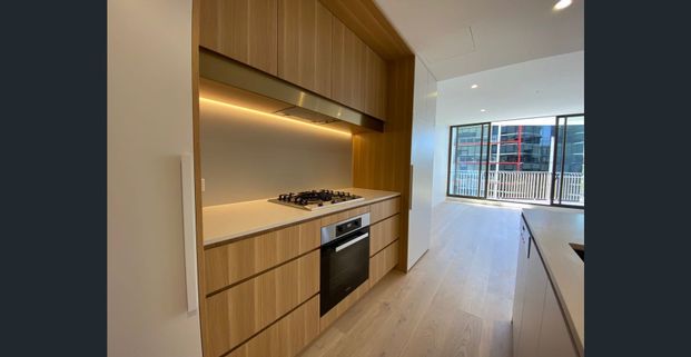 Stylish Living Meets Ultra Convenience - 2 BED - Photo 1