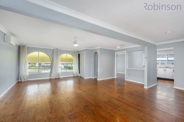 Spacious Family Home with Pool, Double Shed & Ample Parking - Photo 1