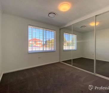 RENOVATED FAMILY HOME - WALKING DISTANCE TO CASULA PUBLIC SCHOOL! - Photo 2