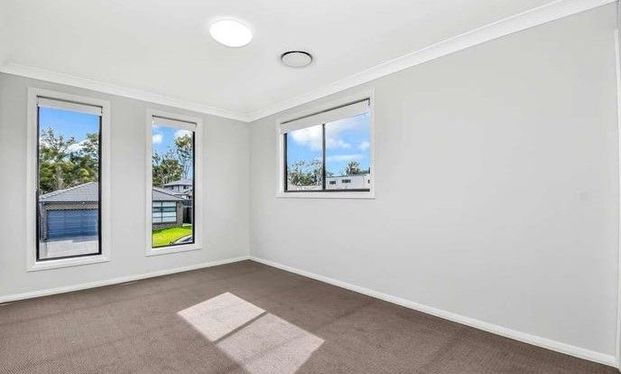 FOUR BEDROOM FAMILY HOME - Photo 1