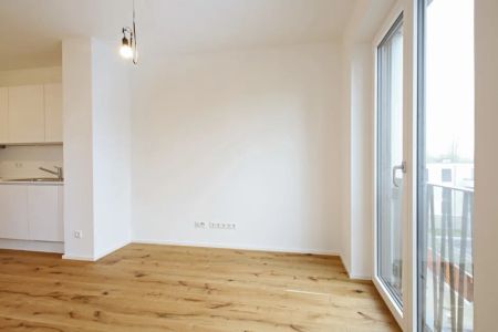 Erstbezug!!! Helle Wohnung mit Fußbodenheizung, Dachterrasse, TG-Stellplatz uvm. - Foto 2