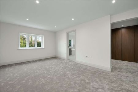 Beautifully finished new-build home just 0.5 miles from Walton-On-Thames Station. This five bedroom family residence combines contemporary design and cutting-edge technology. - Photo 3