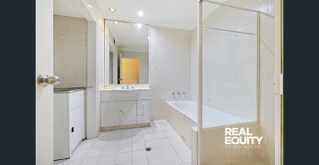 Top-Floor Apartment in a Sought After Lakeside Location - Photo 3