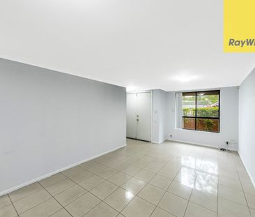 Spacious Tri-Level Townhouse - Light-Filled and Conveniently Located - Photo 1