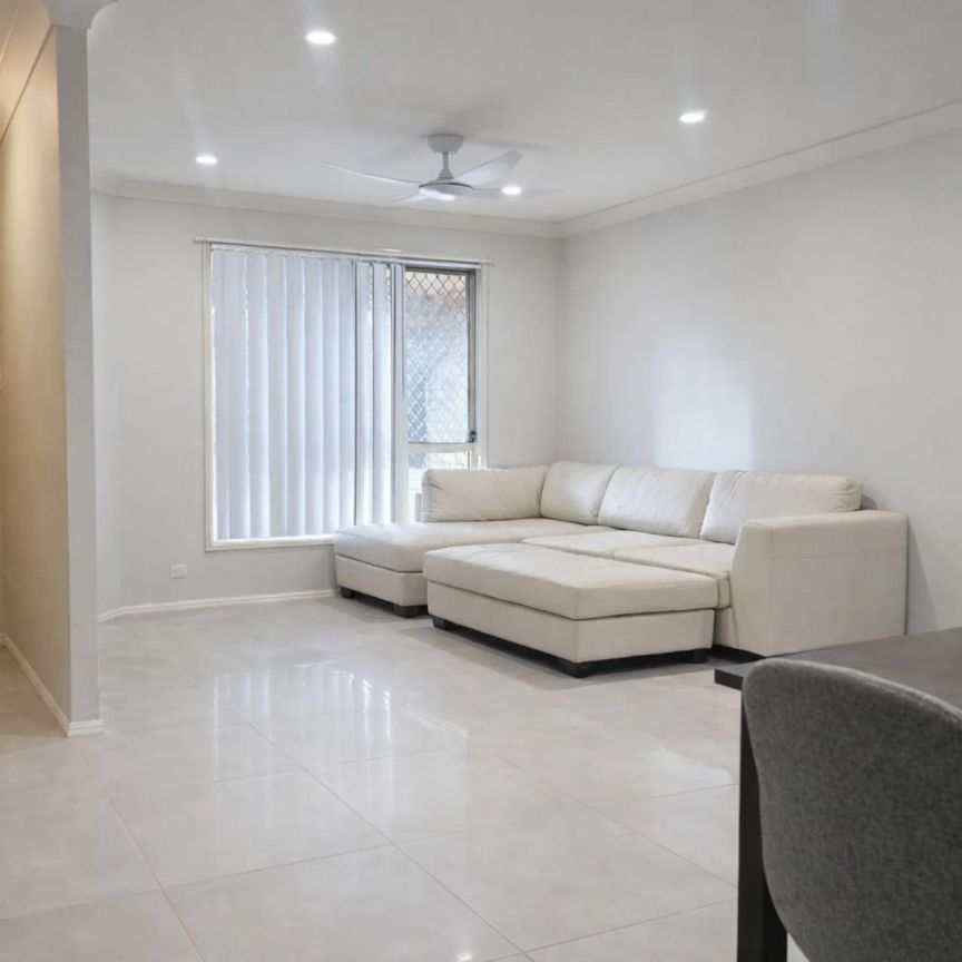 Spacious 4-Bedroom Family Home with Air-Conditioning Throughout - Photo 1