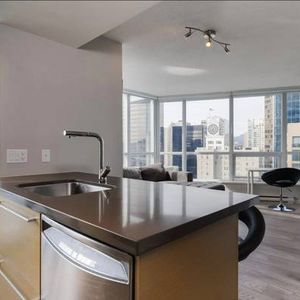 Views! FURNISHED 1 Bedroom Apartment with Den in Downtown Vancouver - Photo 3