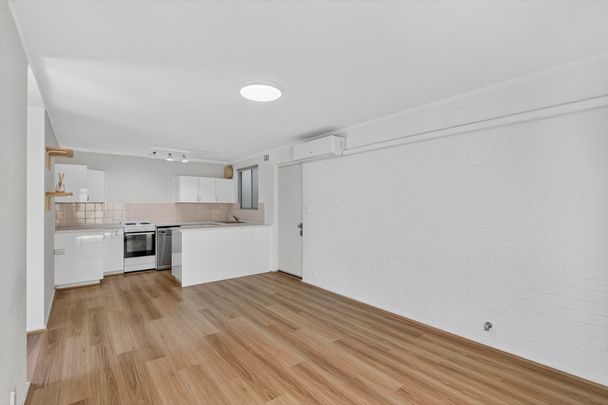 Modern Comfort & Easy-Care Living in a Prime Claremont Location - Photo 1