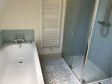 A sensitively modernised three bedroom cottage situated within a complex of Grade II listed buildings and adjoining the National Trust gardens with magnificent views towards the Carneddau mountain range. - Photo 5