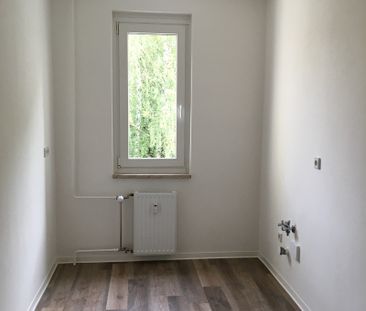 Sanierte 3-Raum-Wohnung in ruhiger Lage mit Wanne und Balkon - Foto 4