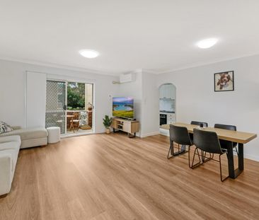 IMMACULATE LARGE UNIT IN A COMPLEX WITH A POOL! - Photo 1