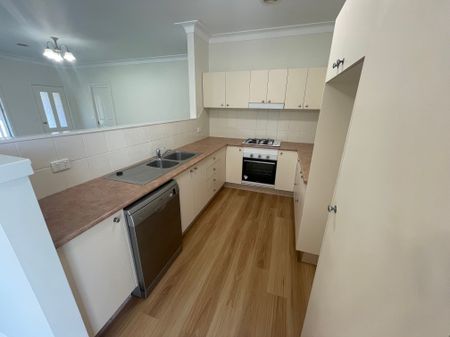 Elegant 2-Bedroom Unit Close to Town - Photo 3