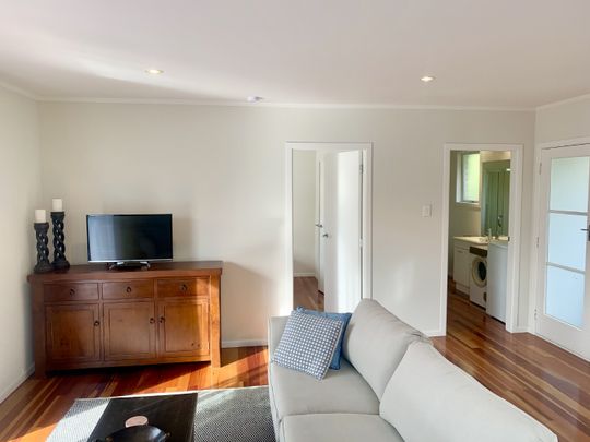 This is a FULLY FURNISHED one bedroom unit tucked away at the rear of the main house. - Photo 1