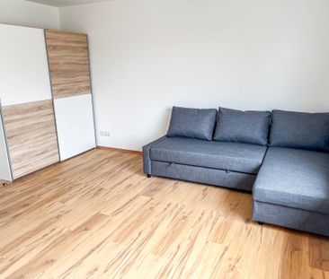 Möblierte Balkonwohnung direkt an der U3-Haltestelle - Foto 1