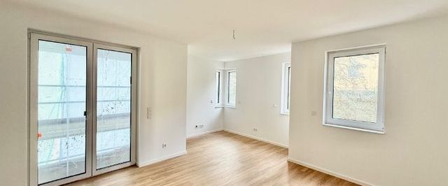 Erstbezug! Zentrumsnahe Einzimmerwohnung mit Balkon & Einbauküche - Foto 1