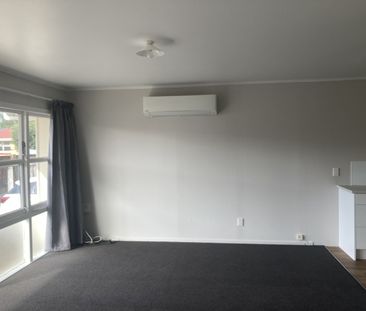 This generous two-bedroom unit offers an open-plan living area, two... - Photo 1