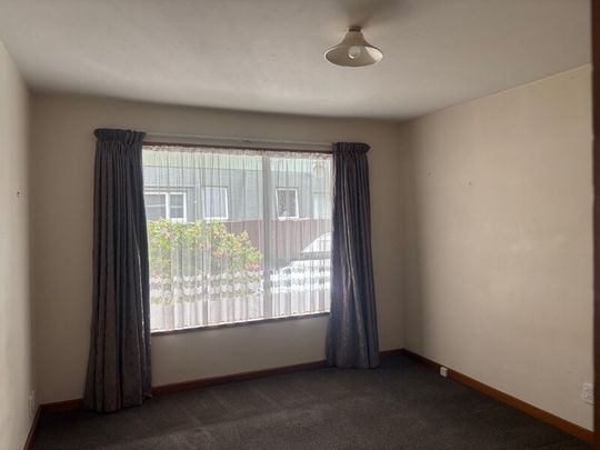 Spacious, Two-Bedroom Unit in Prime Location on a beautiful section - Photo 1