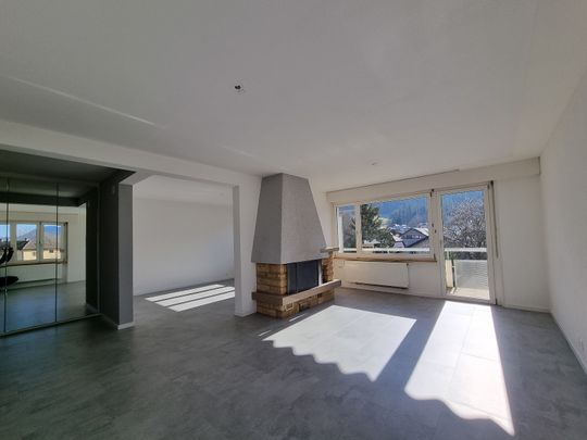 Spacieux appartement de 4,5 pièces au 3ème étage avec balcon et jardin commun - Photo 1