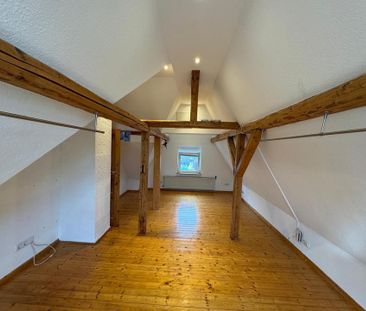 Gemütliche 2-Zimmer Dachgeschosswohnung in Siegen-Eiserfeld - Photo 1
