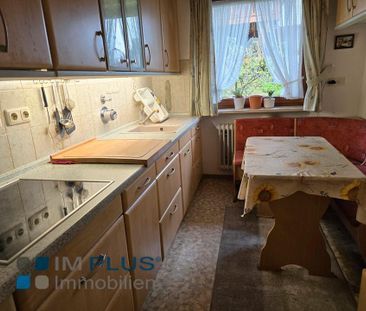Große 2 Zimmer Garten-Wohnung mit EBK, überdachte Terrasse und 2 St... - Foto 4